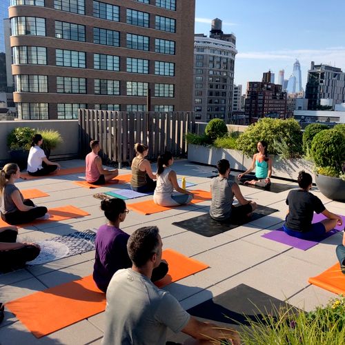 Teacher corporate yoga NYC Rooftop style!
