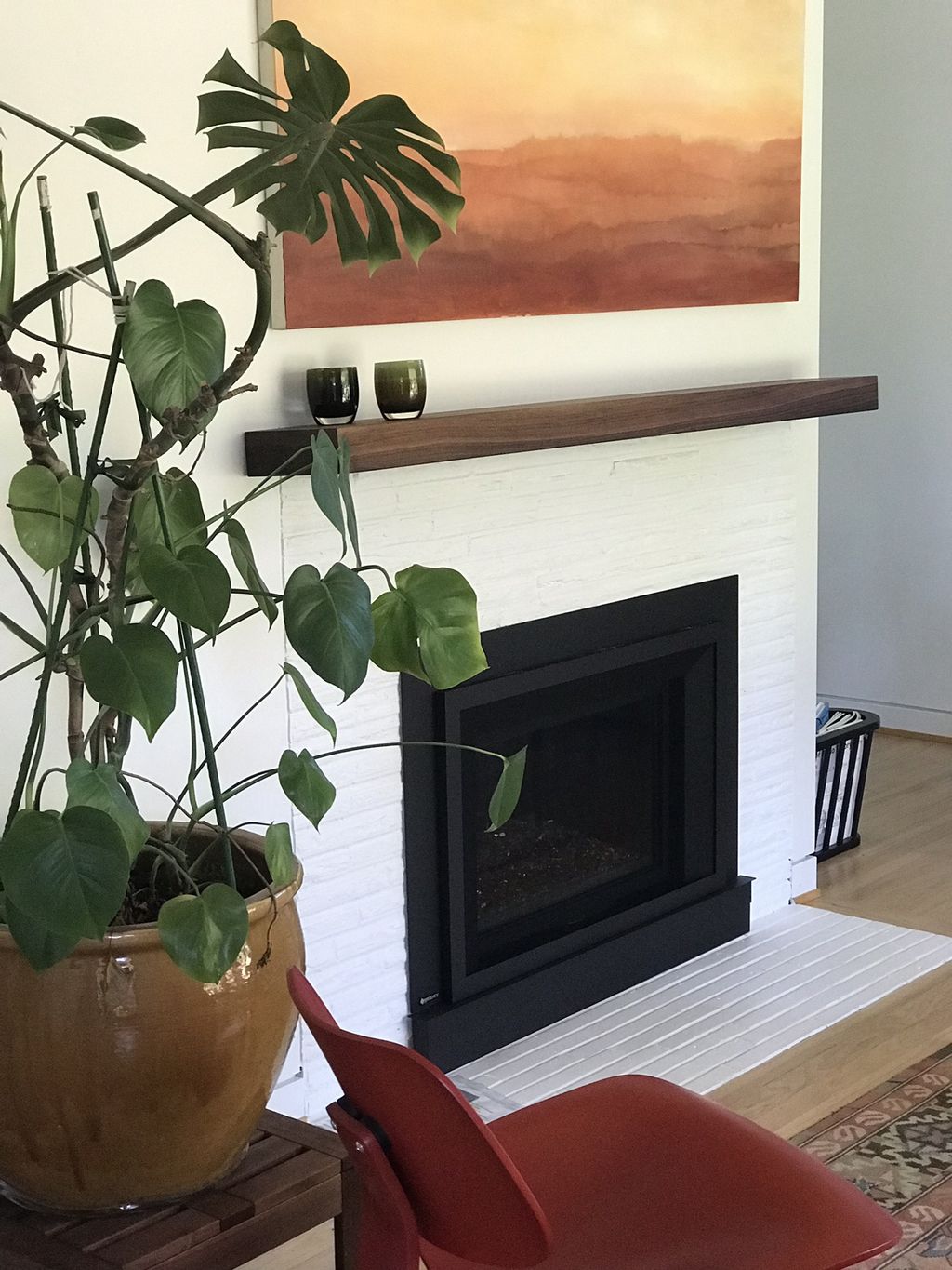 Richard patched and painted two fireplace walls an