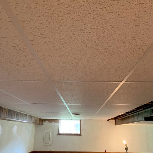 Installed new drop ceiling in a family room. 
