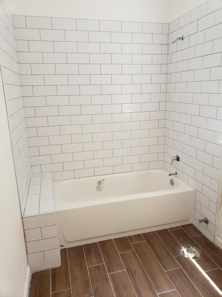 Complete  custom rebuilt  bathroom shower and floo