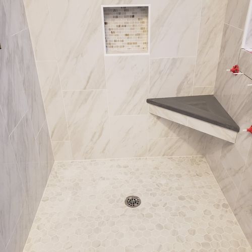 We called Peter to tile our master bathroom shower