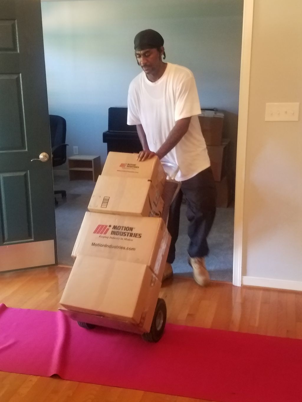 Big Tuck moving boxes out   