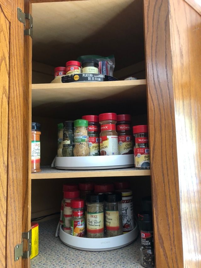 Lazy susans make this spice cabinet neat and acces