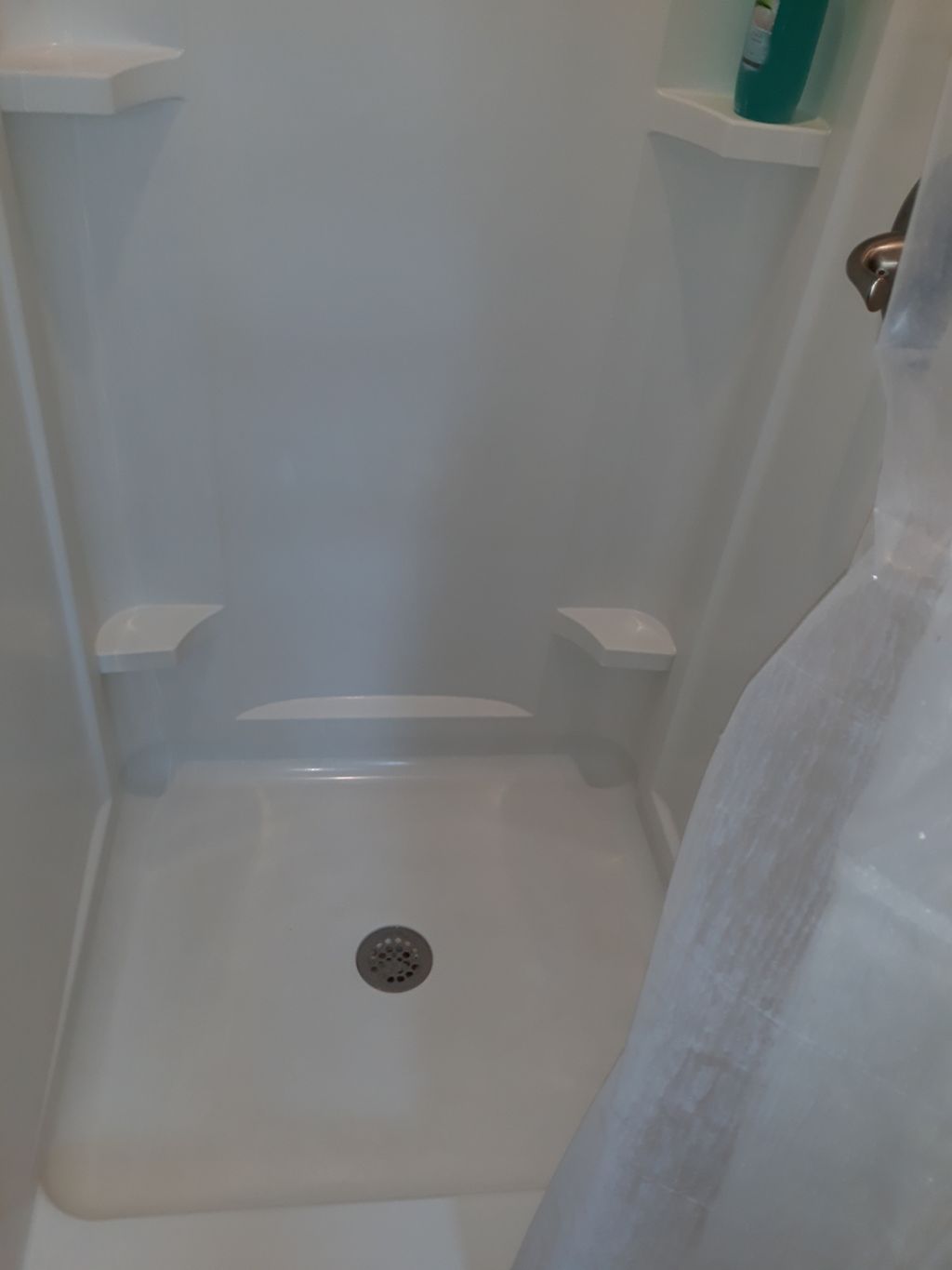 After cleaning of soap scum and debris in shower