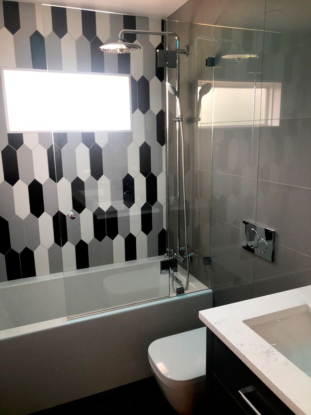 New wall hanging toilet and grohe tile mounted fau