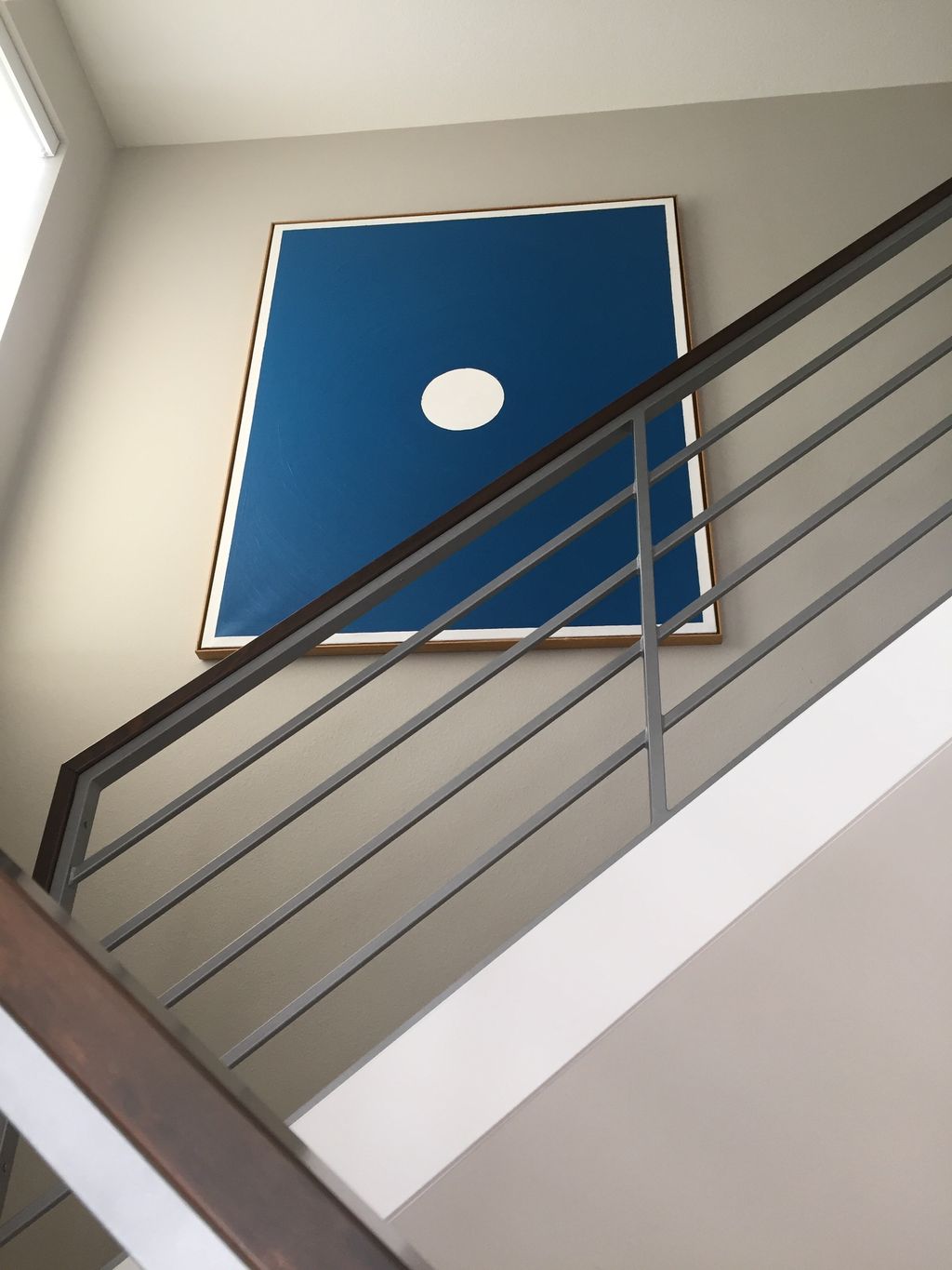 Hanging precious art in hard to reach places is on