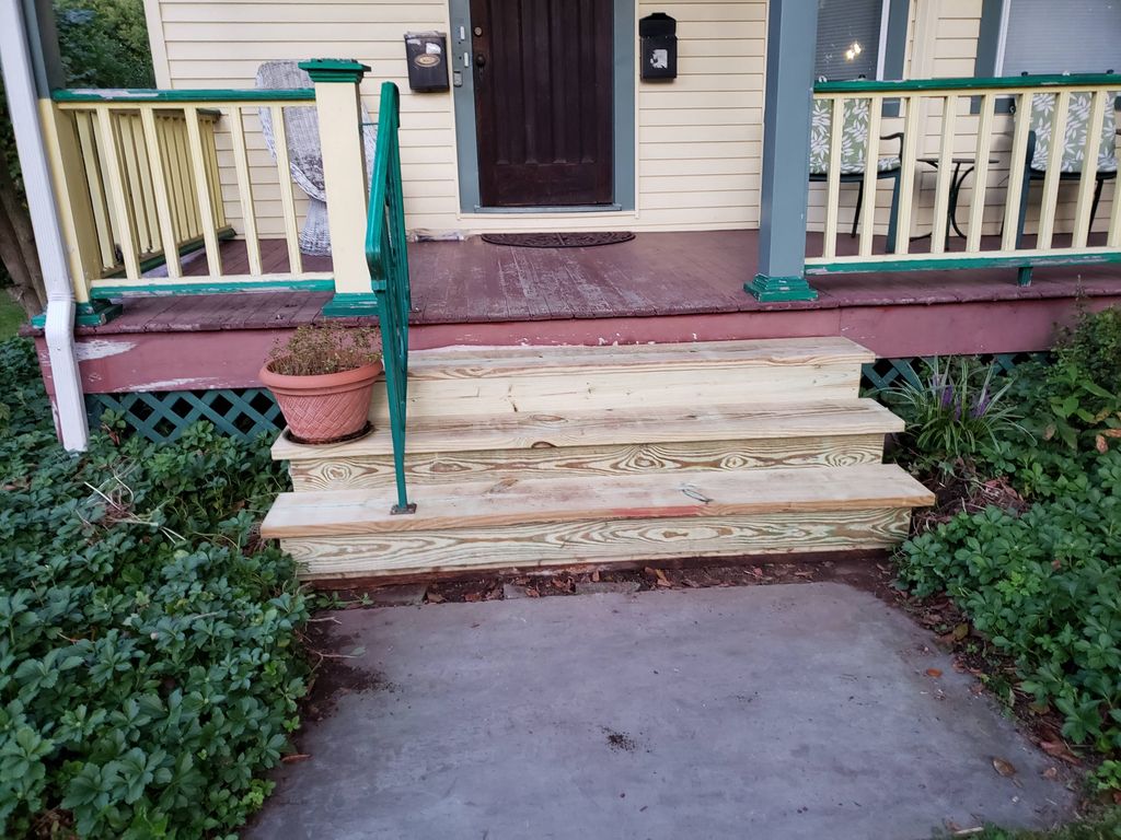 Porch steps and handrail completed 