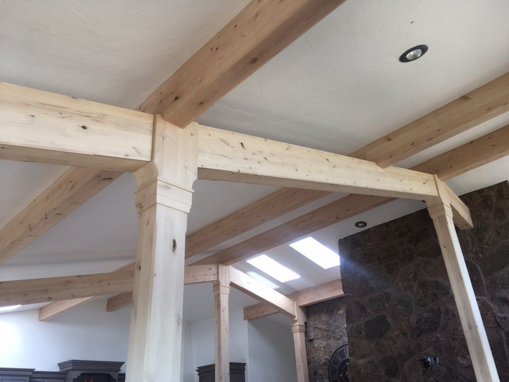Knotty Alder beam wraps.