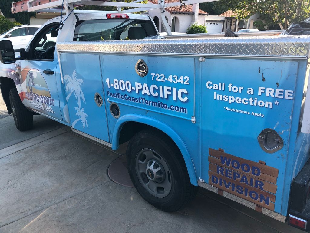 Wood repair truck at a customers house.