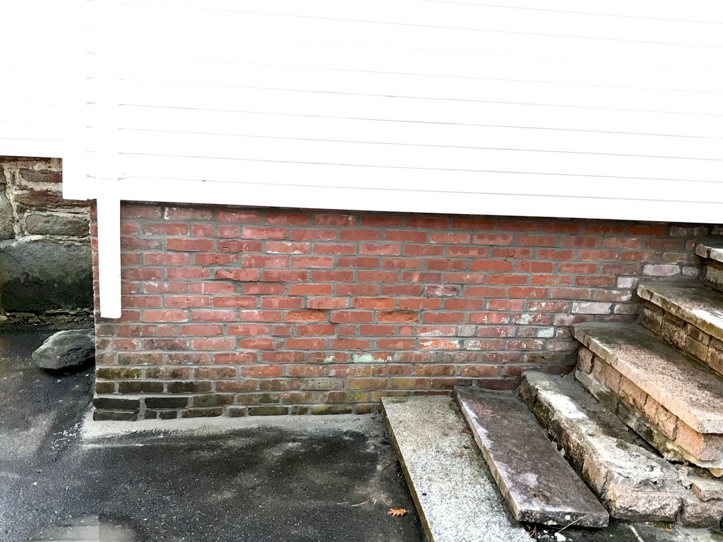 Repaired crumbling brick wall. Came out great