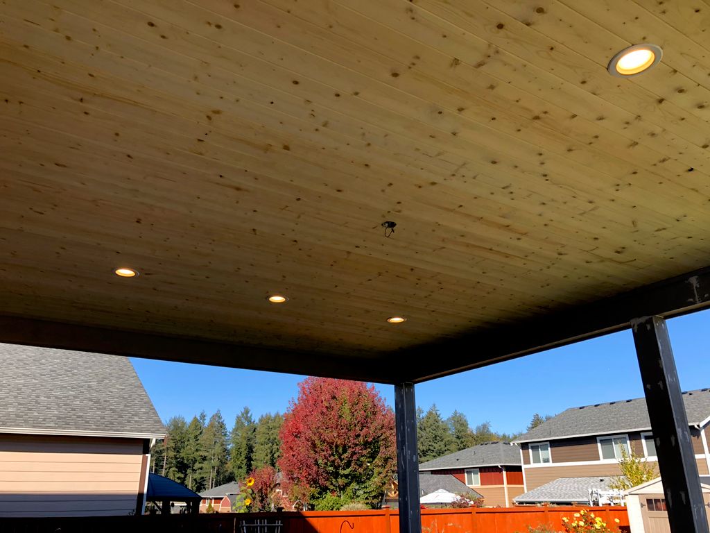 Outside can lights with ceiling fan in the center