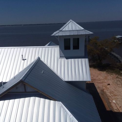 Completed standing seam roof on the water