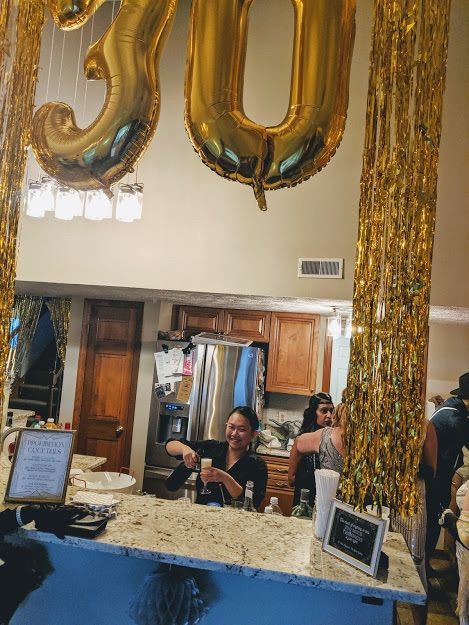 I was making a French 75 at a party celebrating on