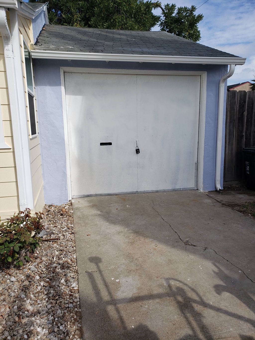 Before: Old flip door converted to a sectional rol