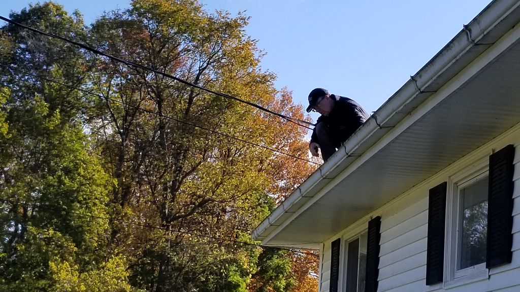 Catskills inspection checking gutters