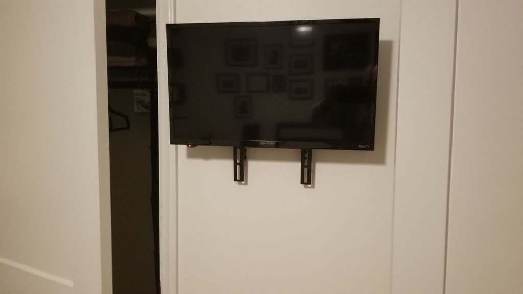 This small TV was mounted in a very small area bet