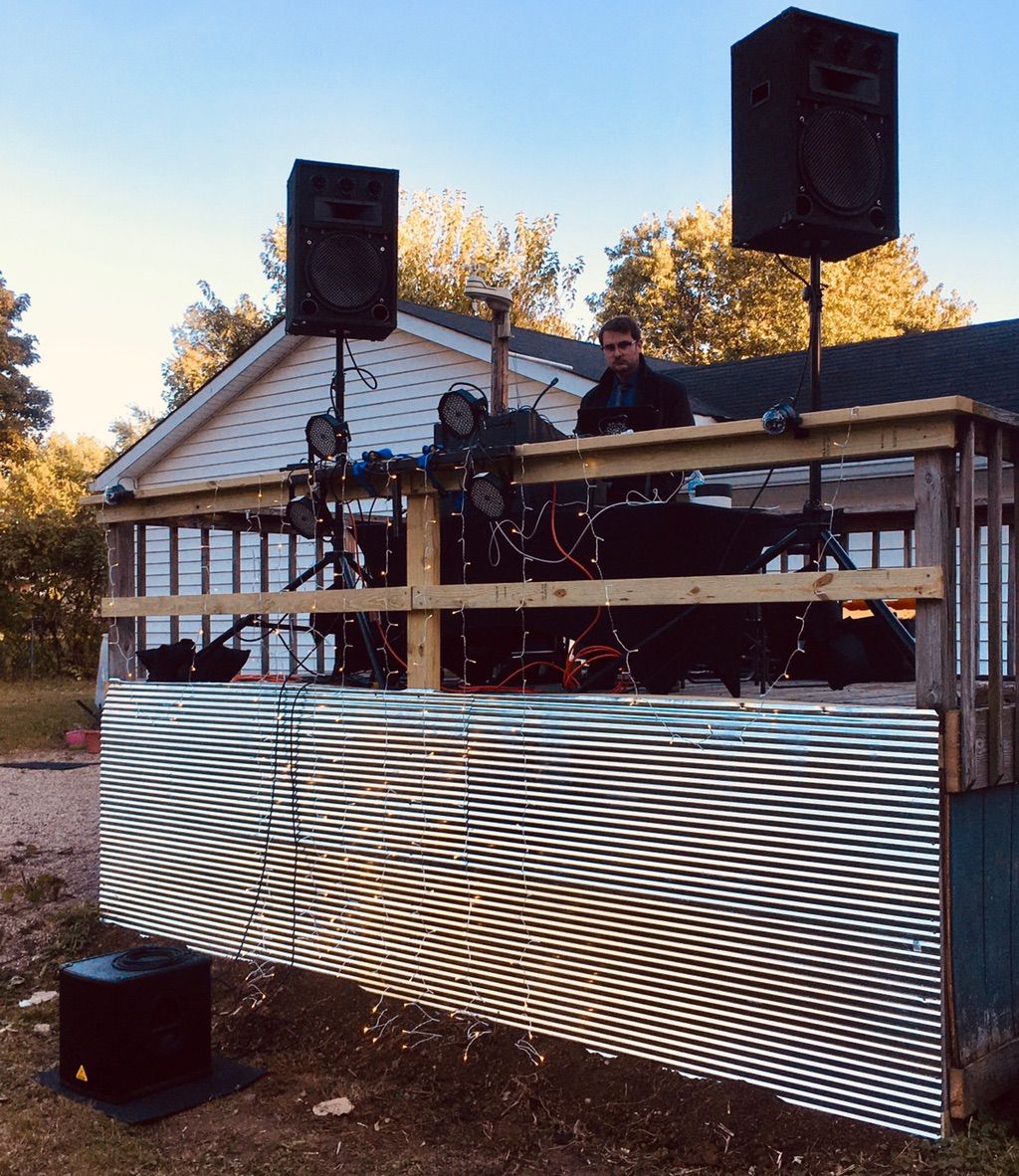 Outdoor wedding reception setup on a balcony