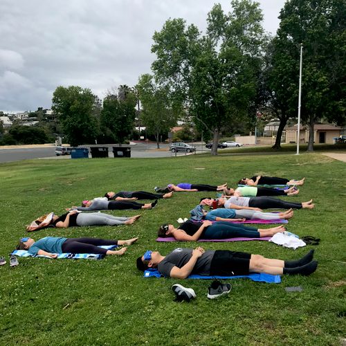 Corporate midday nature yoga class 
