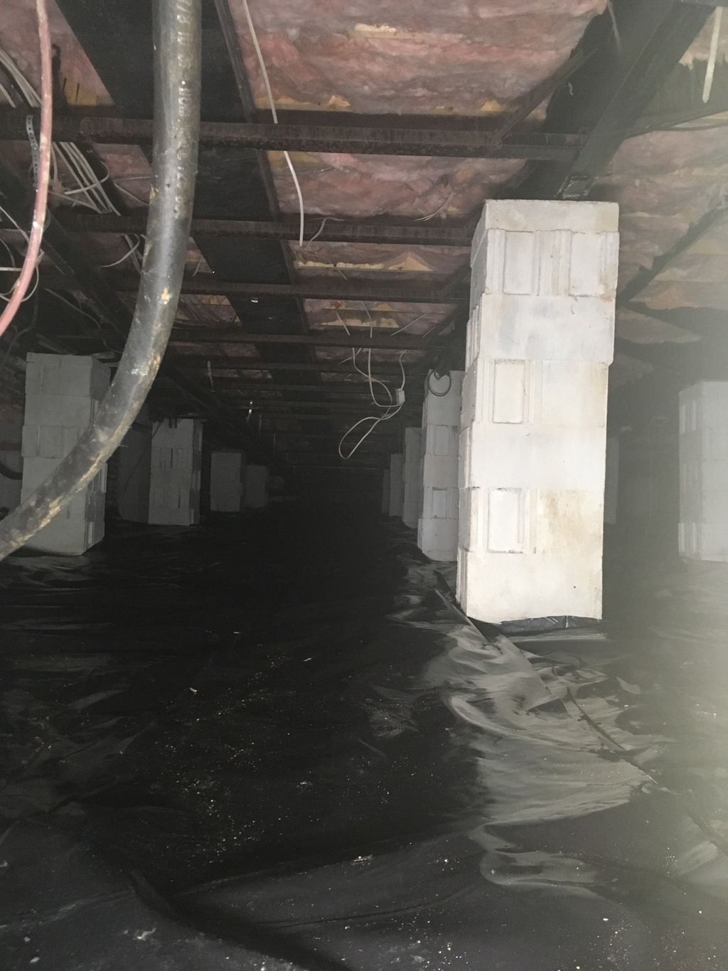 Crawlspace insulation and moisture barrier install