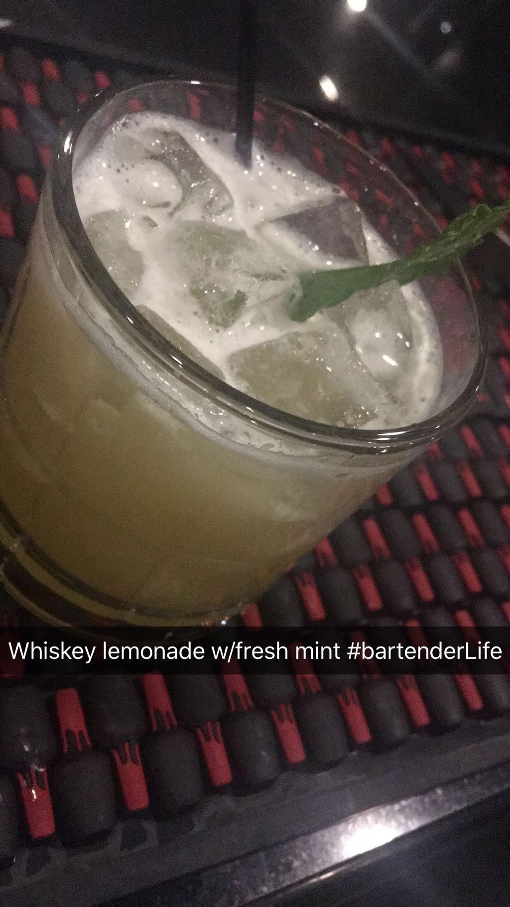 Whiskey Lemonade w/ fresh mint sprig 