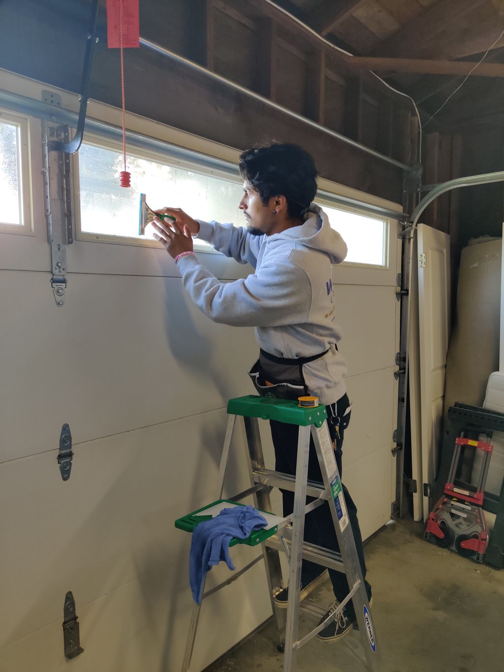 Adding privacy film to garage door windows