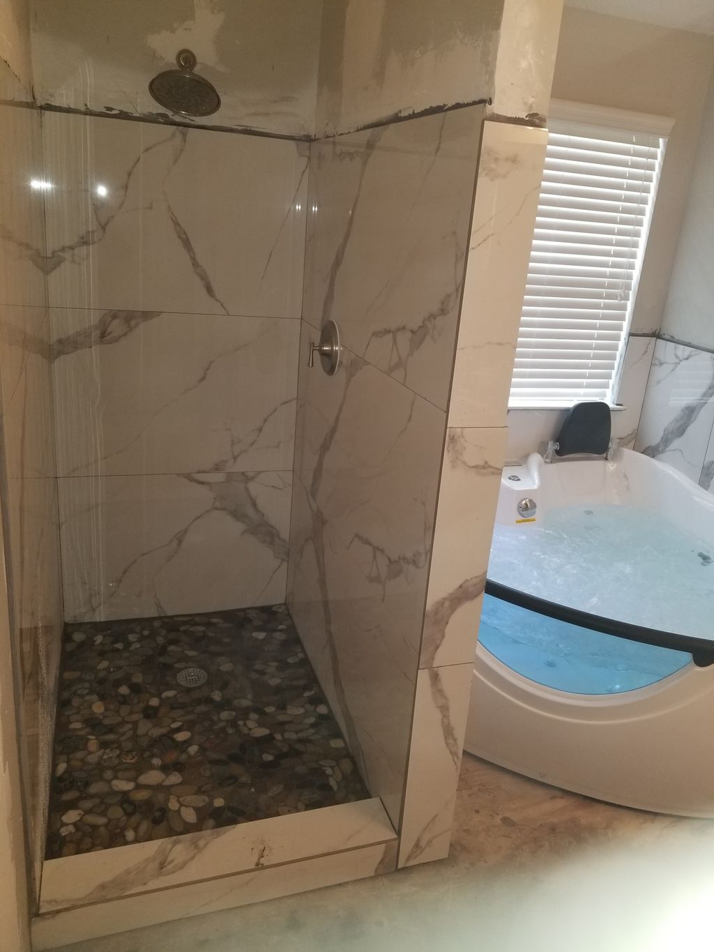 Shower and whirlpool install completed.