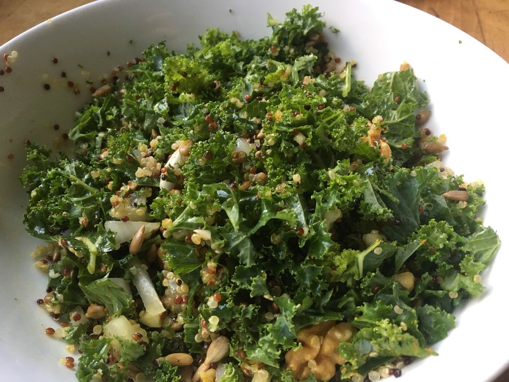 Kale salad with soaked sunflower seeds and walnuts