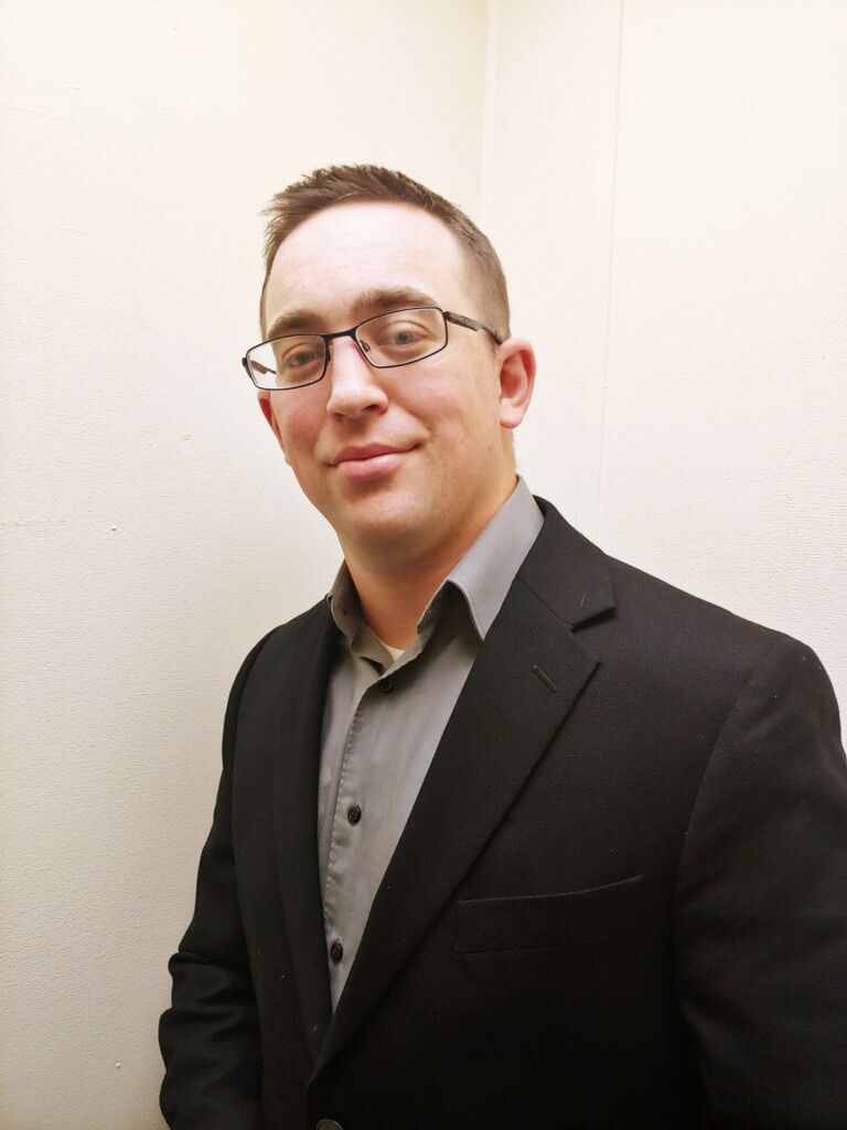 Travis J. Cline