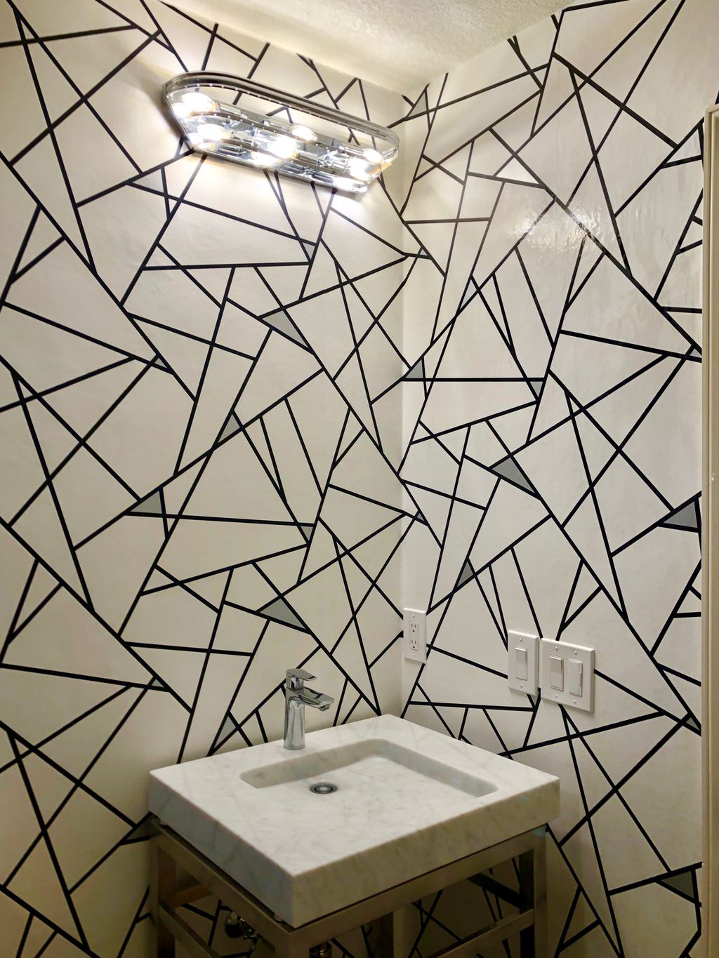 Geometric Wallpaper Installation in Powder Room