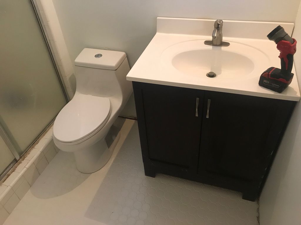 Brand new toilet installed, new floor tile install