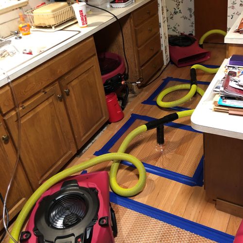 Drying a wet Hardwood Floor - PuroClean of Central