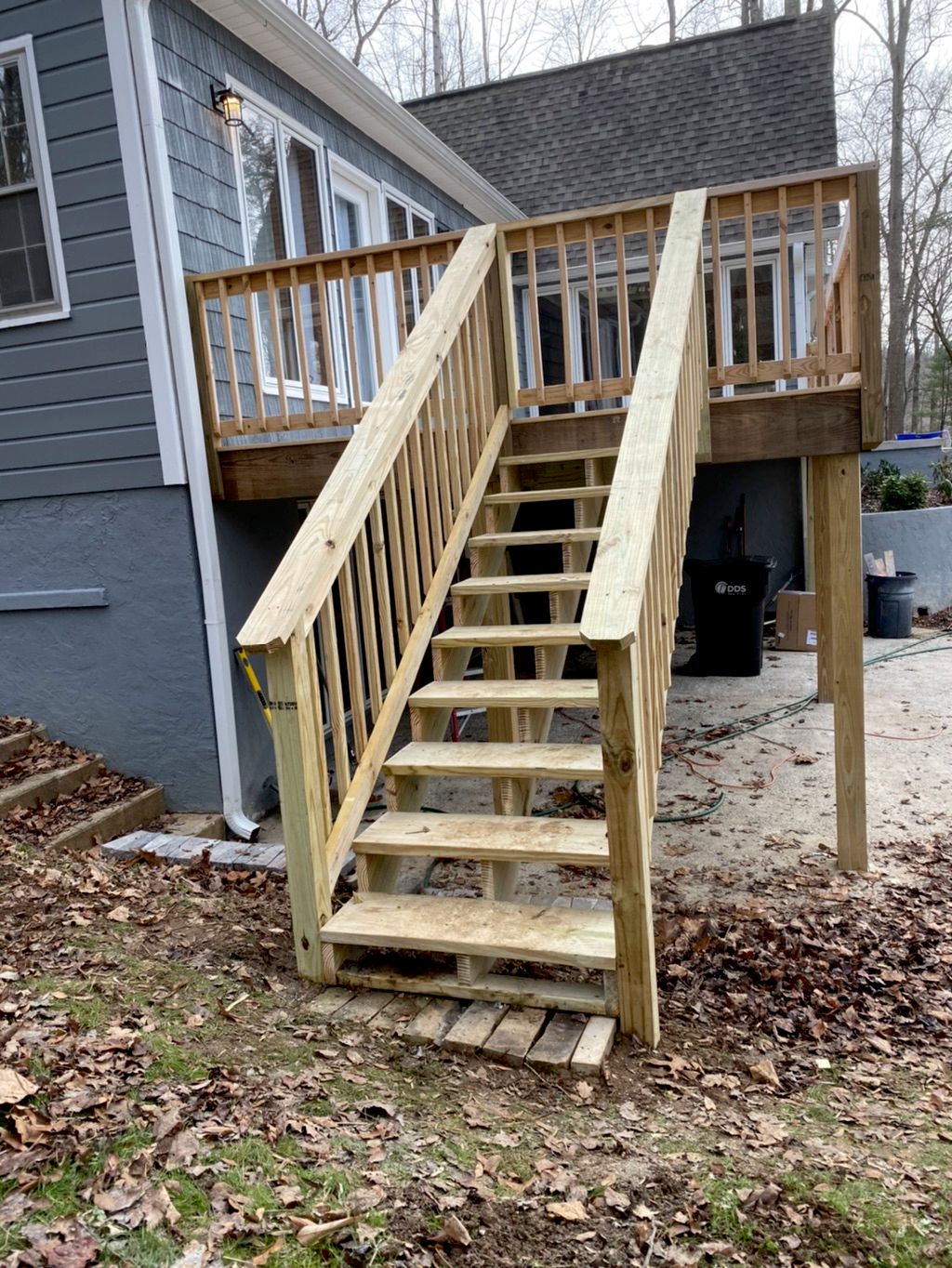 Stair addition on existing deck. With gate for dog