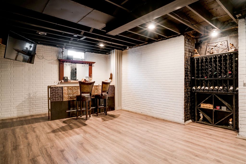 Recess lighting in a basement adds to the atmosphe