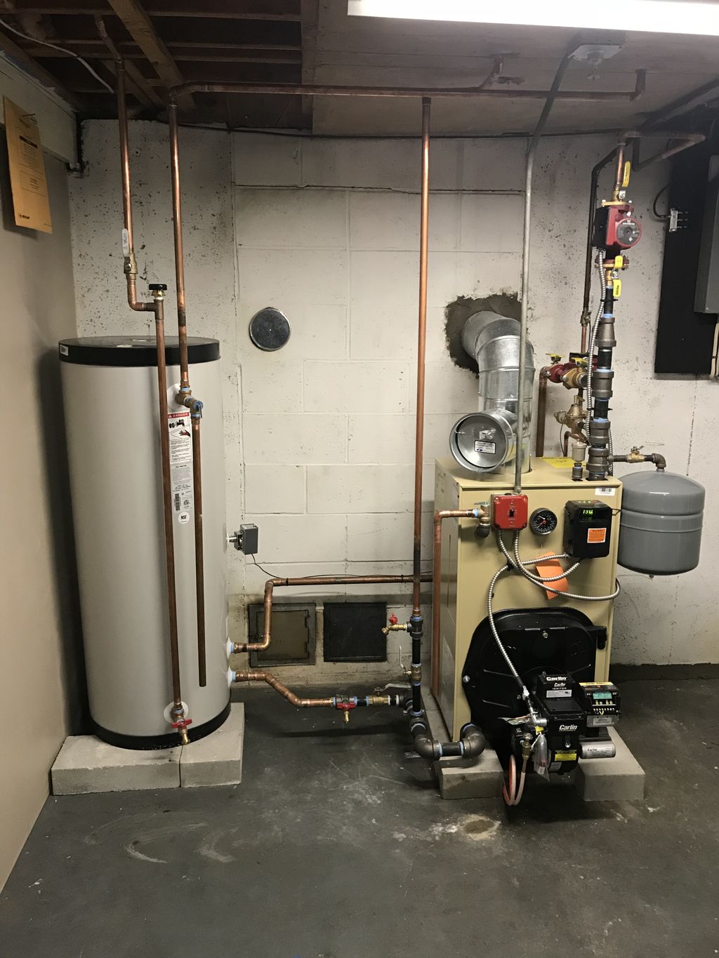 Oil fired boiler and storage tank
