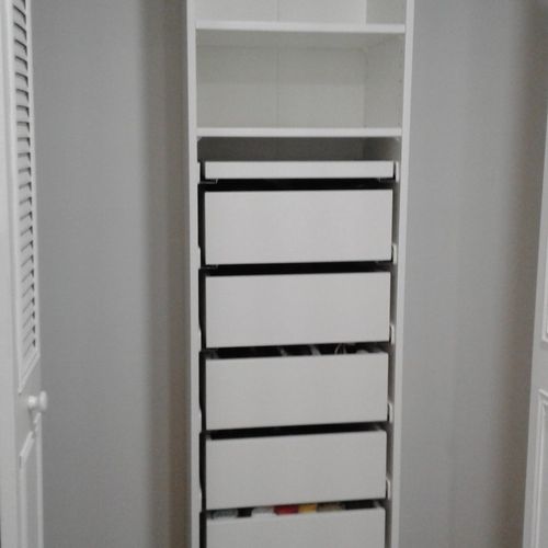 Lukas installed shelves in my reach-in closets. He