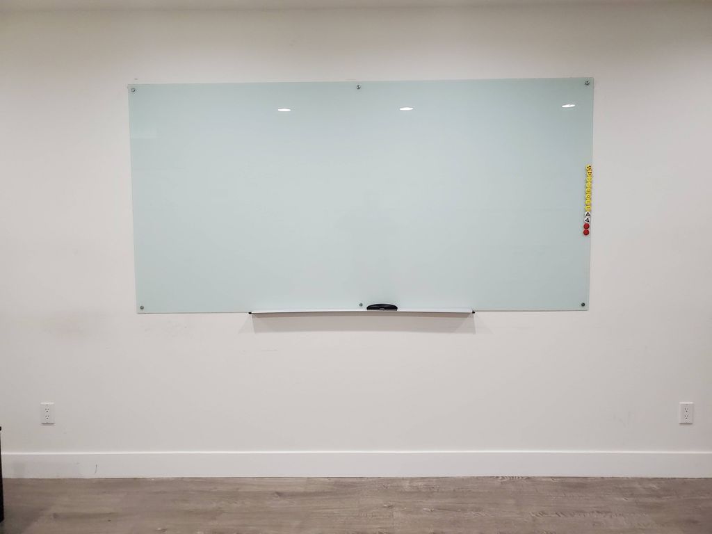 They installed this large glass whiteboard at my o