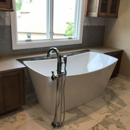 free standing tub with tub filler.