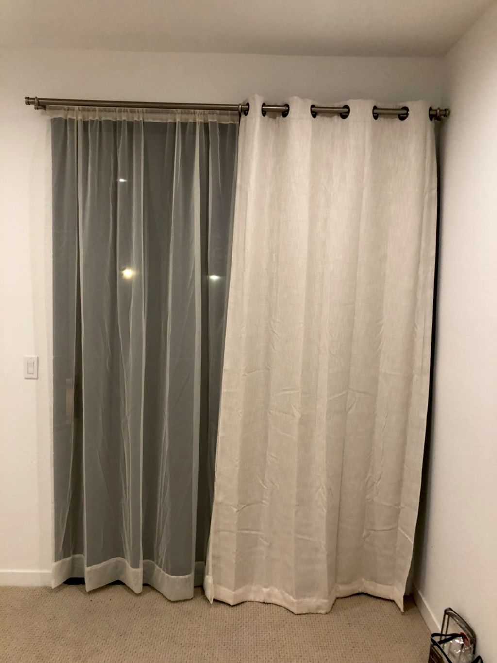 Installed new double curtain rods with sheer and b