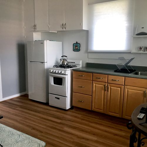 New kitchen, vinyl flooring and Paint