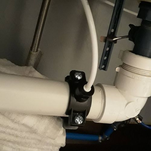 Drain tap line line installation under bathroom si