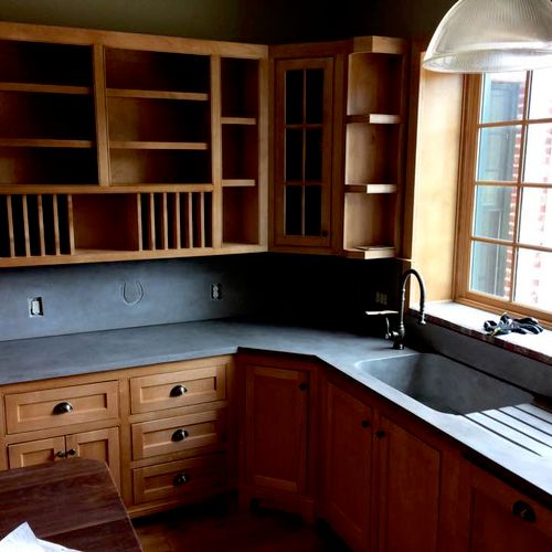 Maple kitchen with concete sink and counters
