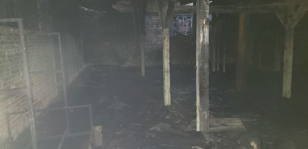 Burnt tire warehouse after