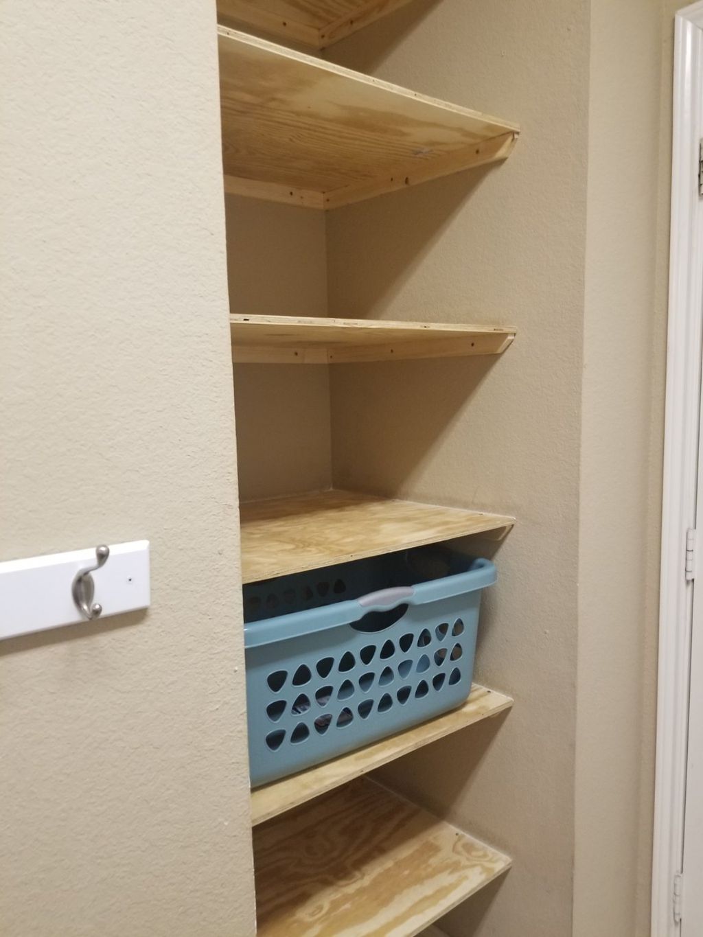 Had shelving added to a nook in my laundry room.  