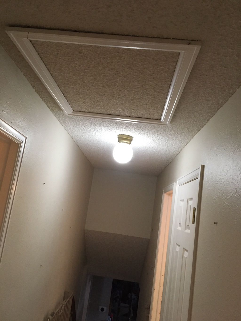 Hallway with pop corn texture.