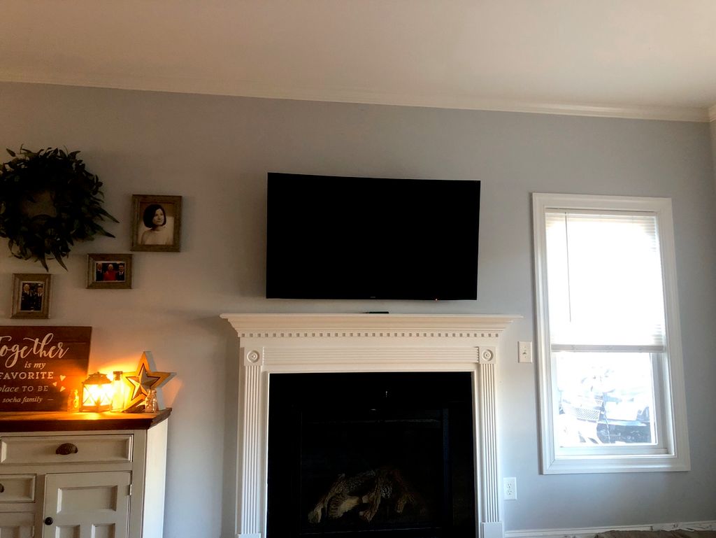TV mounted and installed a new outlet to conceal w
