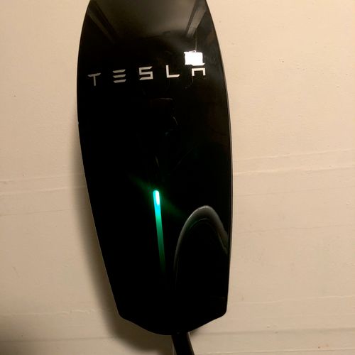 Hired to install my Tesla wall charger, did an exc