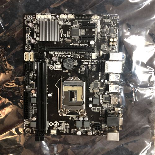 Old motherboard after processor removal and replac