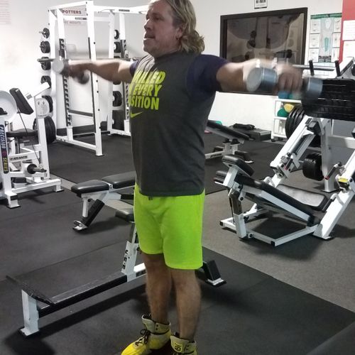 Check out Dave training his shoulders at the gym. 
