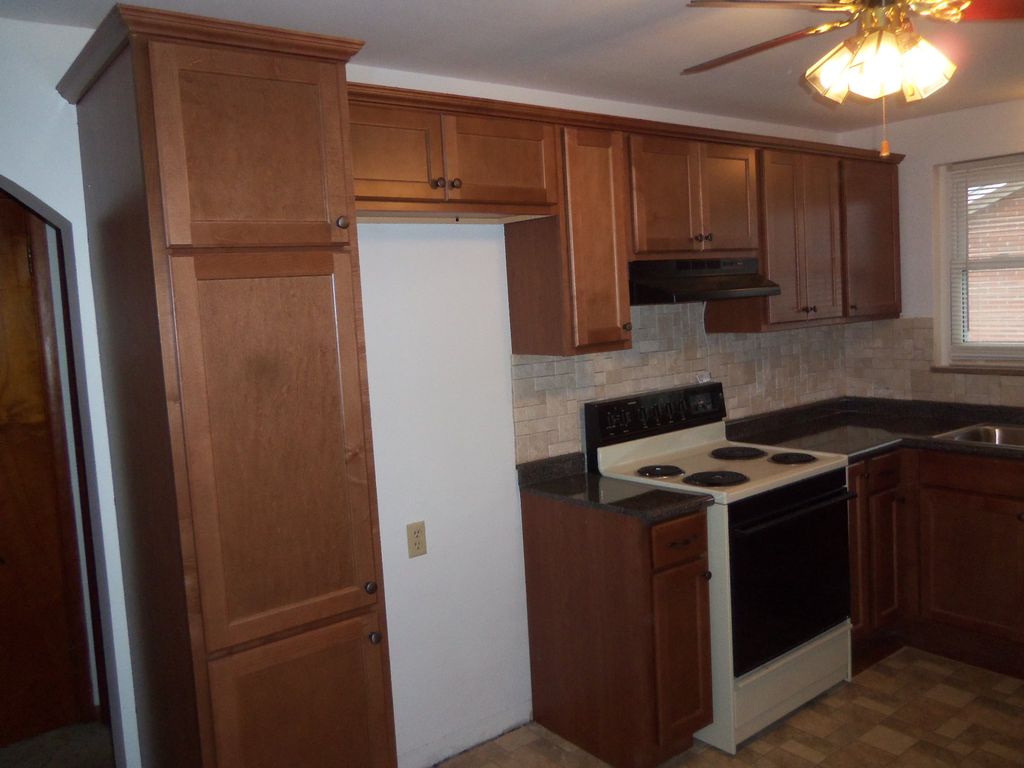 Another kitchen done.  Put Crown Molding around th