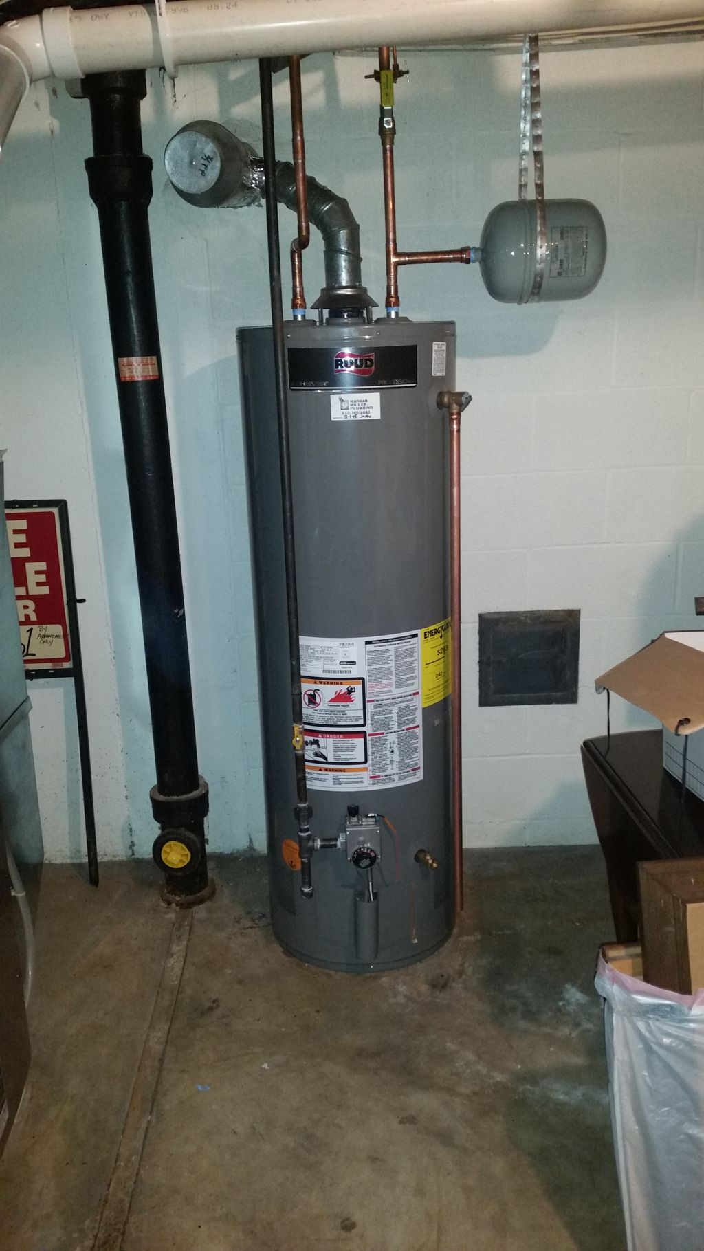 Water heater replacement with proper code upgrades